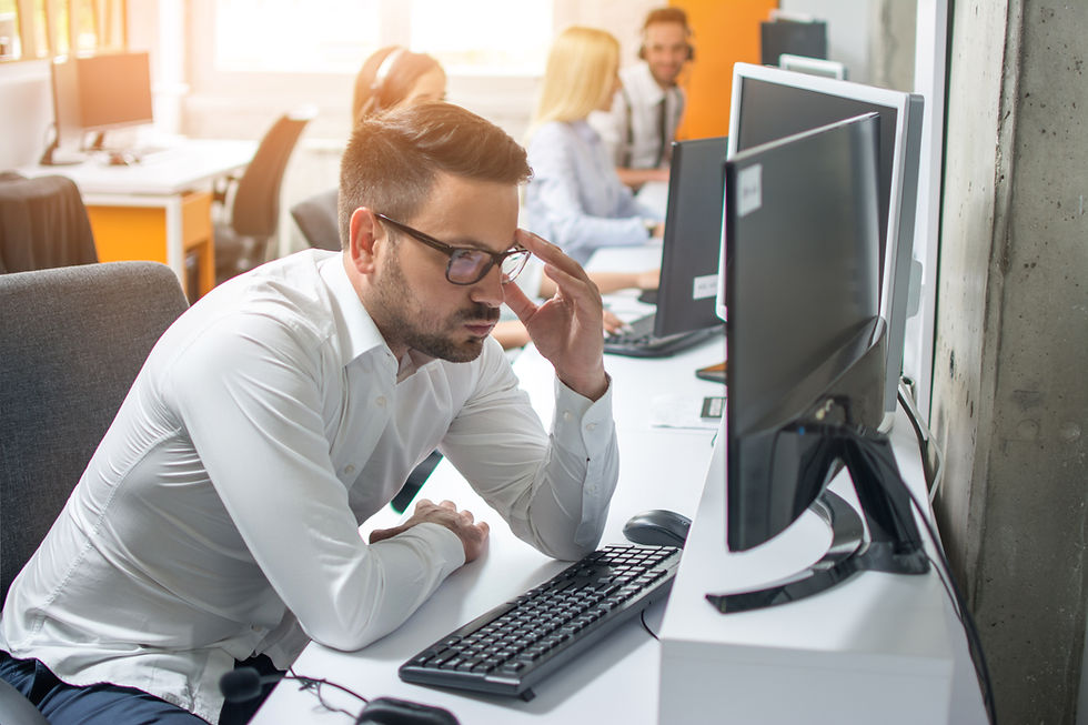 worried-businessman-looking-computer-screen-his-workplace-office.jpg