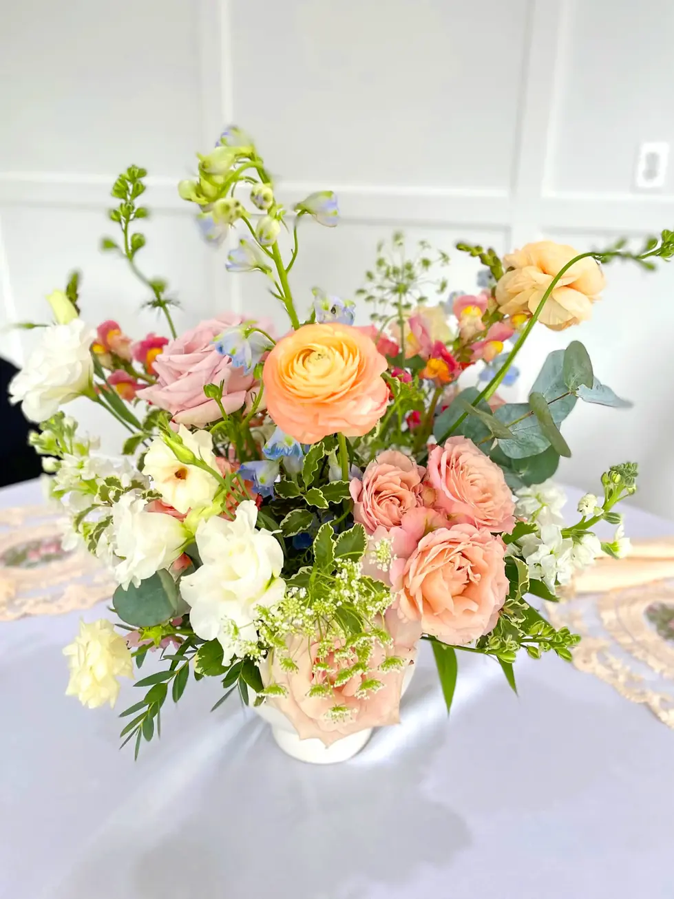 Peach and white floral arrangement
