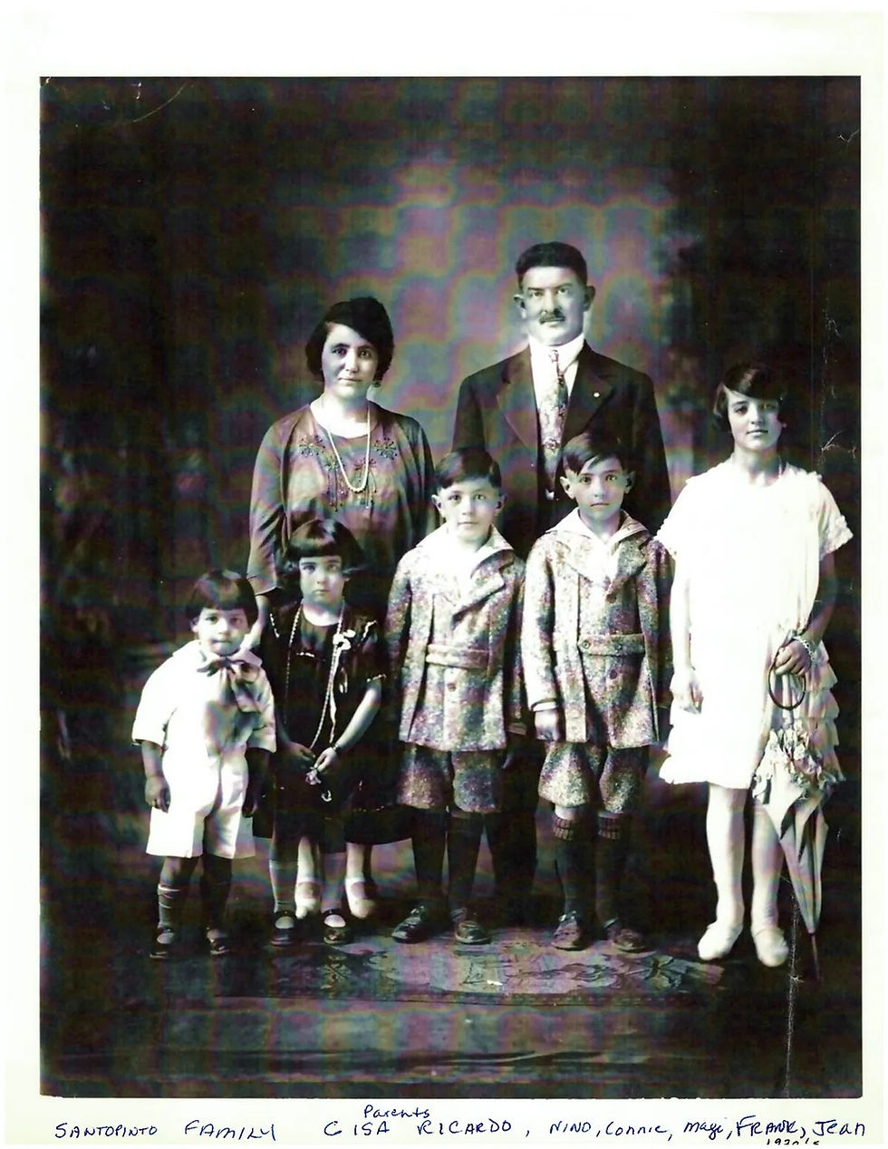 Buccini family portrait with two parents and four children