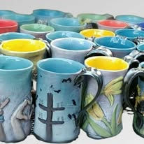 Collection of handcrafted mugs, various designs