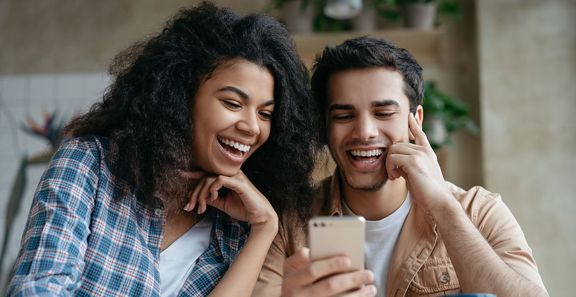 Man and woman laughing