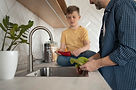 close-up-father-washing-vegetable.jpg