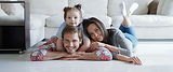 young-caucasian-family-with-small-daughter-pose-relax-floor-living-room-smiling-little-gir