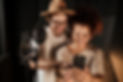 beautiful-couple-stylish-singers-happily-using-phone-working-together-modern-sound-recordi