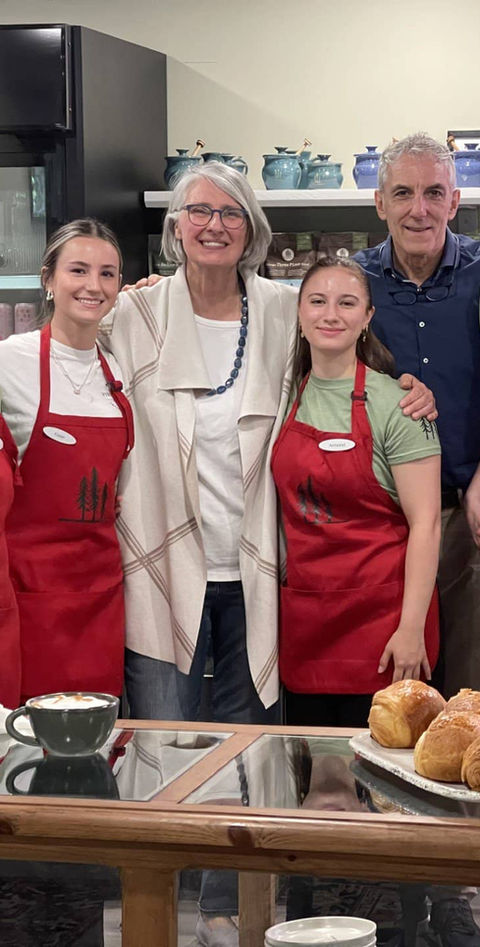 Three Pines staff smiling in store