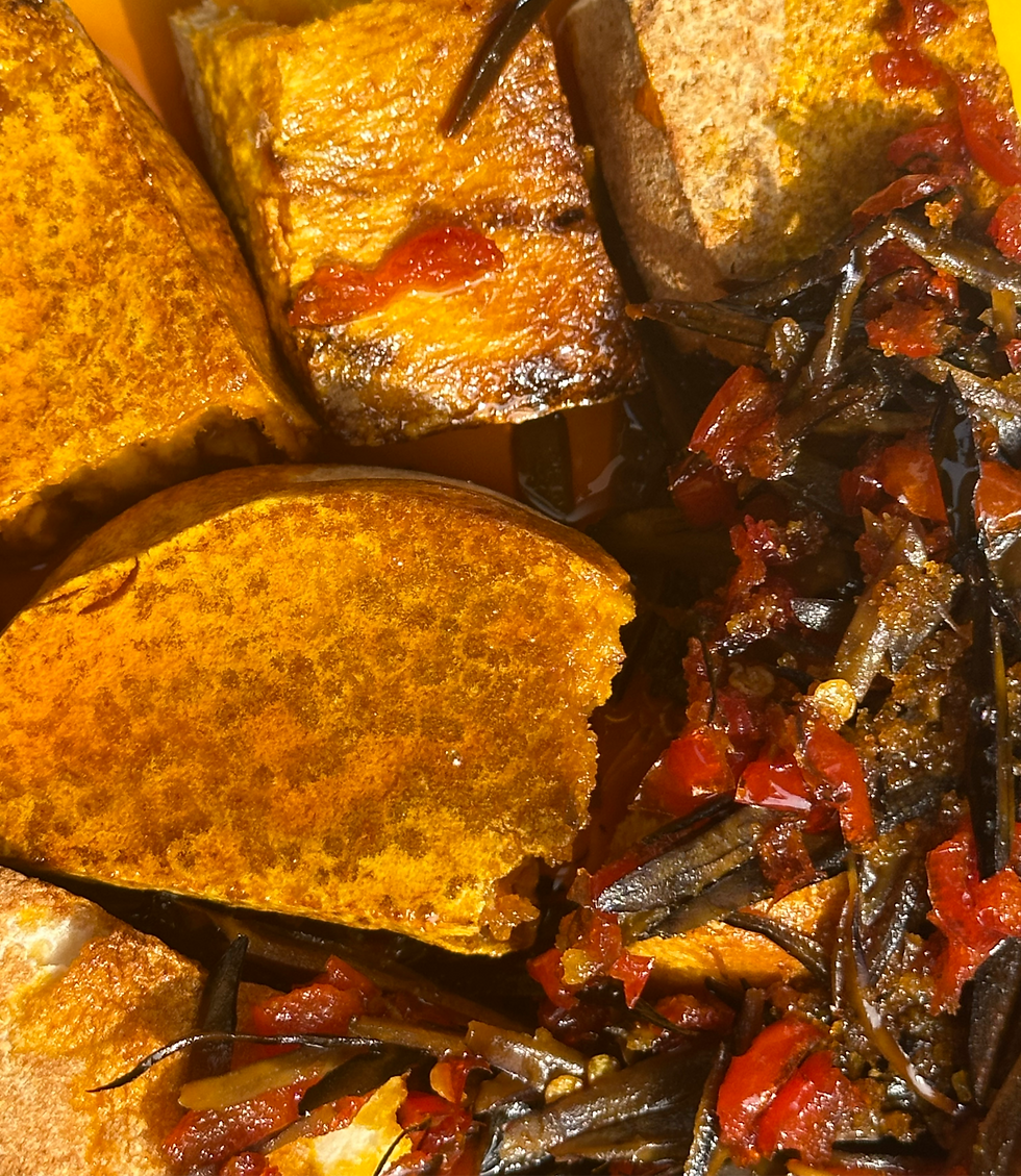 Roasted yam with Red Palm Oil sauce