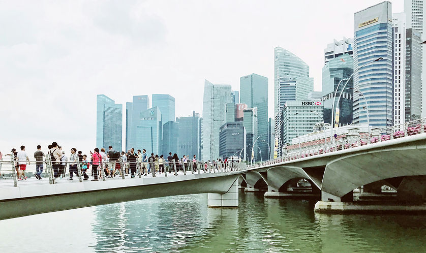 CIAC2025 FAQs page, showcasing a vibrant Singapore skyline, the location of the Canada-in-Asia Conference 2025. Page