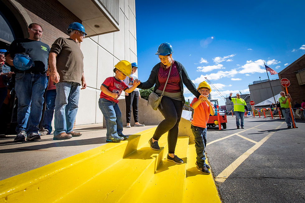 Family leaving Hard Hat Tour