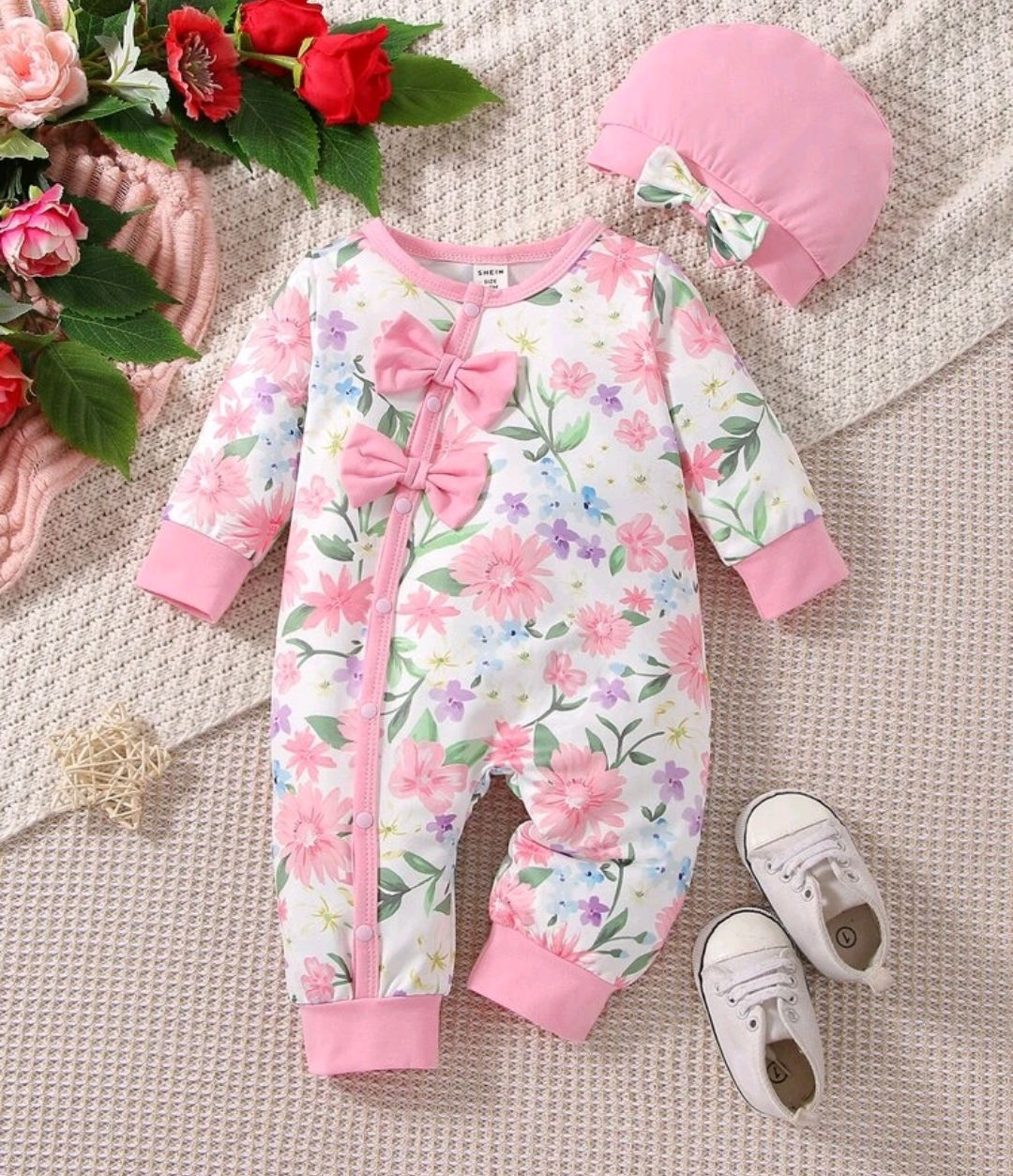Long sleeved jumpsuit with hat