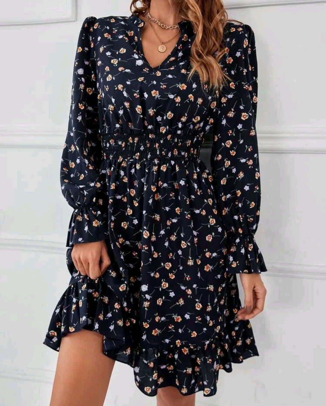 Long sleeved, shirred waist dress 