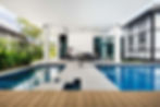 A black-and-white Good Class Bungalow at Cable Road by Designworx Interior Consultants has a conservation block—pool patio wraps around to give it a seamless flow outdoor garden landscaping Good class bungalow GCB Singapore interior designers interior design timeless rooftop dining terrace landed properties luxurious landscaping ideas landed properties outdoor lounge penthouses architect Singapore Pandemic