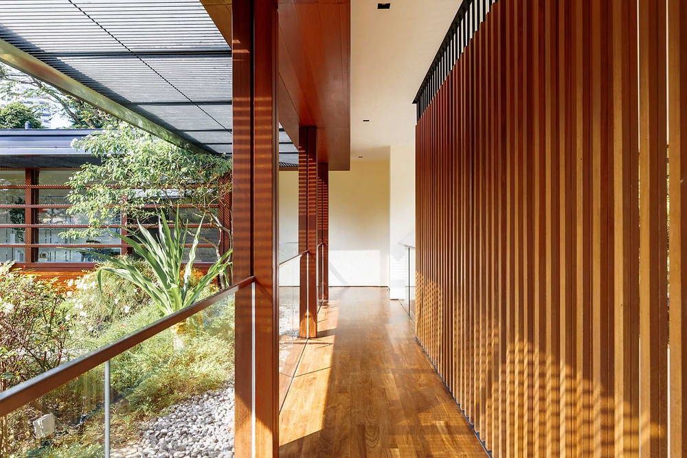 The wooden screen shields the house from the heat of the sun