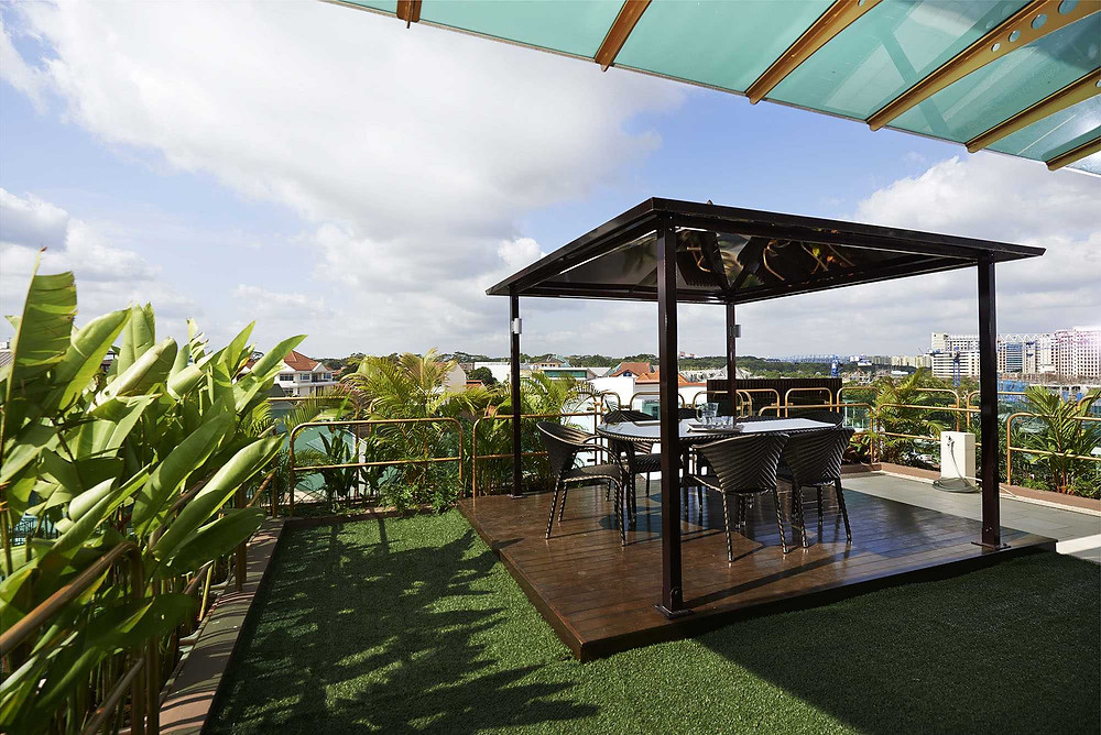 outdoor garden landscaping Good class bungalow GCB Singapore interior designers interior design timeless rooftop dining terrace landed properties luxurious landscaping ideas landed properties outdoor lounge penthouses architect Singapore Pandemic A Rooftop with A View