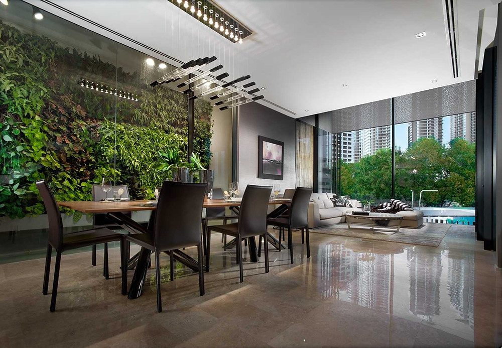 If the dining area is where the family usually gathers, add a green feature wall as the backdrop. (Photo: Designworx), designworx interior consultant