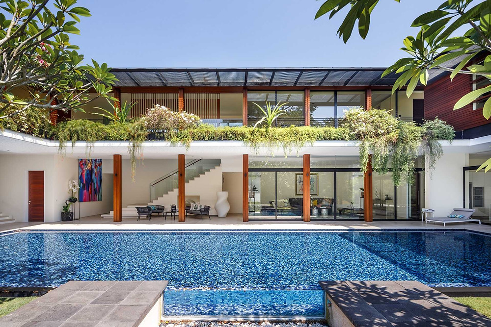Good Class Bungalow at Nathan Road features interiors by Designworx Interior Consultant; the architectural design is the work of Guz Architects outdoor garden landscaping Good class bungalow GCB Singapore interior designers interior design timeless rooftop dining terrace landed properties luxurious landscaping ideas landed properties outdoor lounge penthouses architect Singapore Pandemic