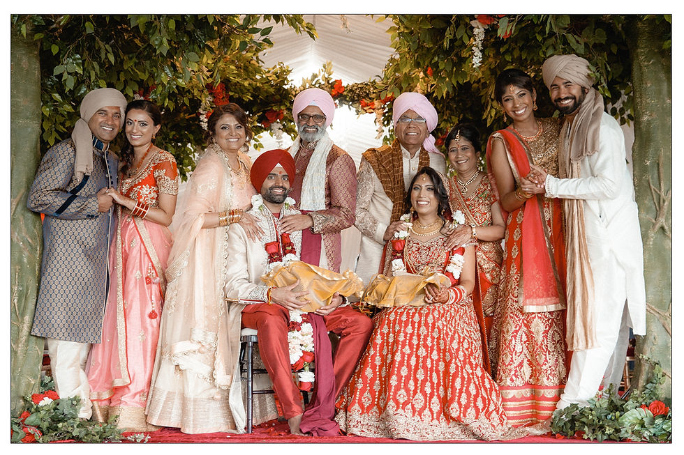group portrait of families of bride and groom after ceremony