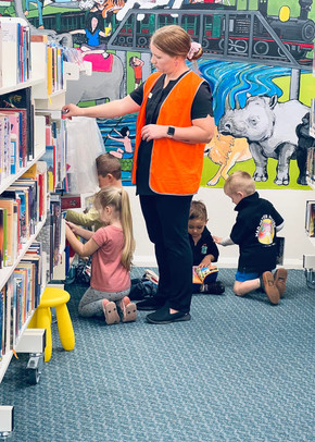 LibrarySharingABook.jpeg