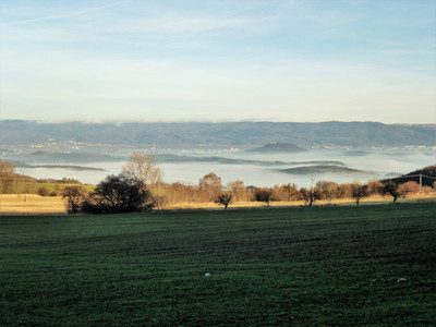Teplice topící se v mlze při pohledu od Kostomlat