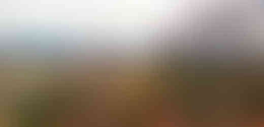 Od kostela svatého Jana Nepomuckého ve Velké Chuchli jsou Modřany jako na dlani