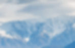 Blue sky and blue mountain.