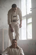 two-crazy-men-straitjackets-abandoned-clinic-163275776.jpg