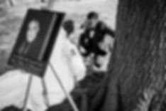 Bride touching groom's face after wedding ceremony