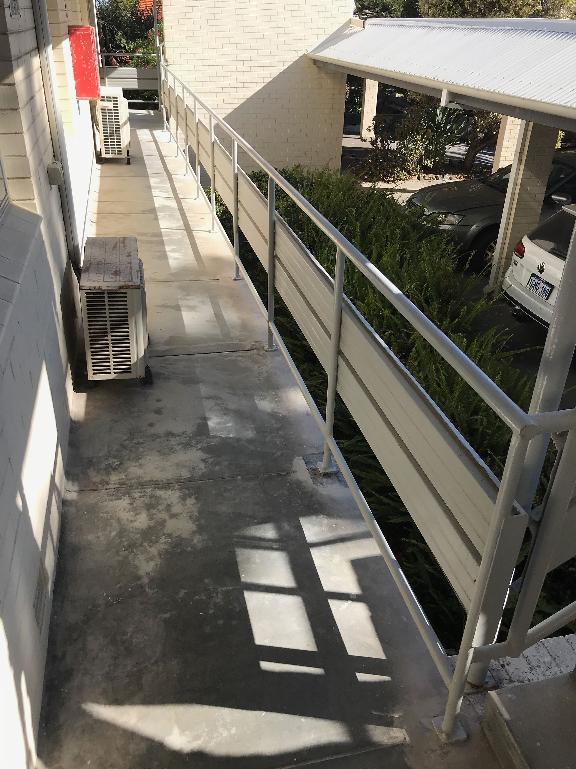 Conspar was engaged to treat concrete cancer at the common access areas of this residential strata complex in Cottesloe (Perth). Part of the process was treating the rusted balustrade fixings - an avenue for concrete cancer to develop.