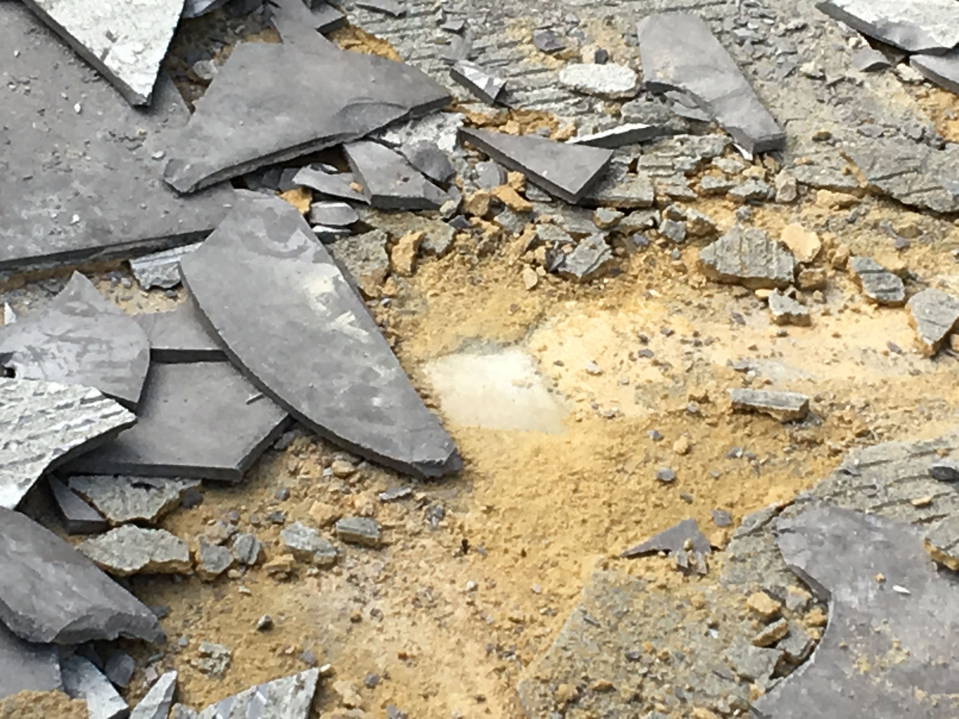 Conspar works begin at this Wembley Downs 
property that has been experiencing water ingress problems. The first stage involves removing the original tiled floor of the balcony.
