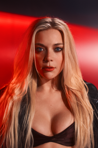 Becky Hill Turns Heat Into Power On "Hands On Me"