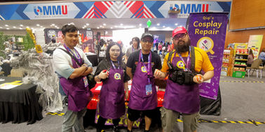 Qiqi's Cosplay Medic posing in front of their booth at Noizucon 2024. From left to right: Irfan, Qiqi, BlackKri, Tony