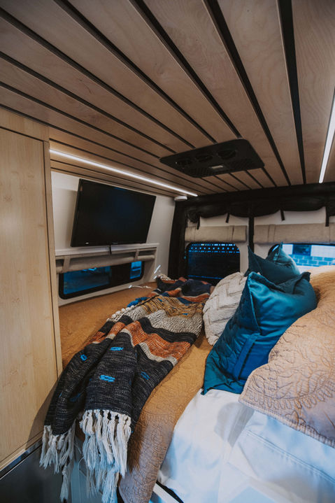 Drifter bed area with tv mounted