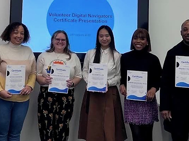 Group of people holding Digital Navigator certificates