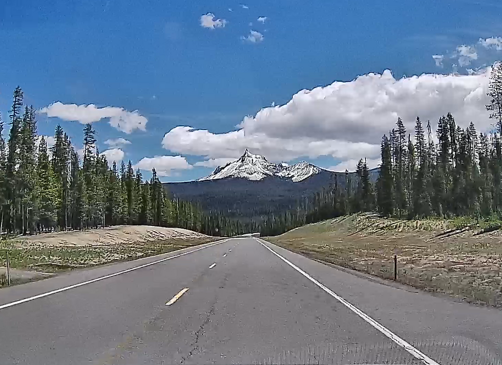 Mt. Theilson, an extinct volcano in the Cascades. It's just along the road as if that's the sort of thing one sees driving around every day.