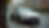 Eye-level view of a parked Zoom Car ready for rental