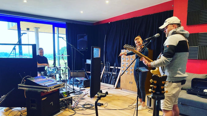 musicians rehearsing with natural light