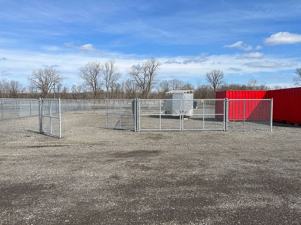 contractor yards fully fenced with six foot chain link, featuring sixteen foot entrances with double swing gates