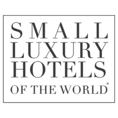 Small Luxury Hotels of the World text logo on white background.