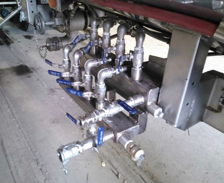 Stick built manifold for in transit heat and steam