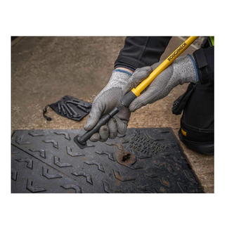 manhole lifting key tip on manhole drain 