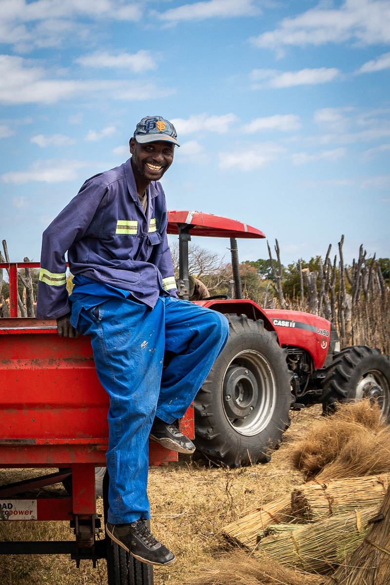 zimbabwean man on a tractor