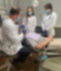 Dr. Brad Litkenhous and Students in Exam Room