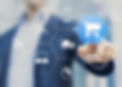 Businessman touching e-commerce button on a virtual interface with icons of shopping cart