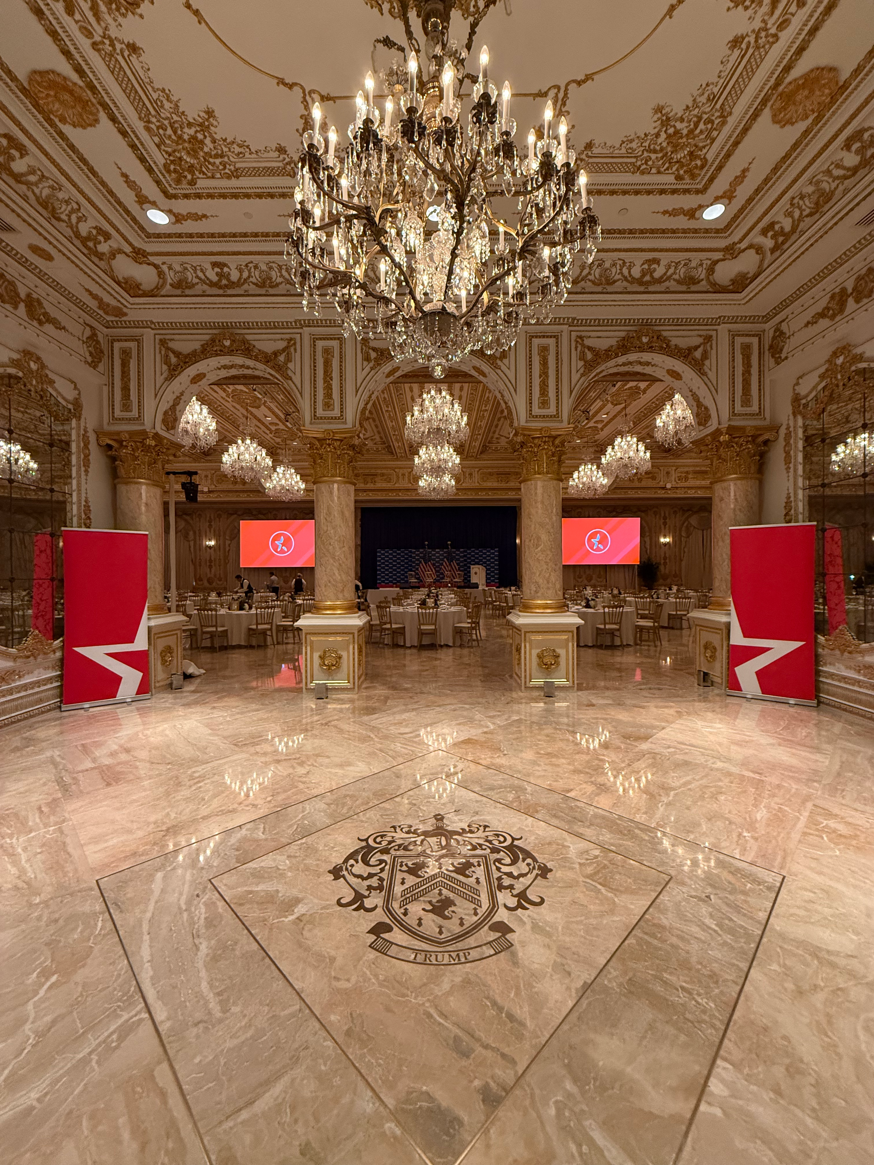 Elegant formal dining setting with crystal chandeliers