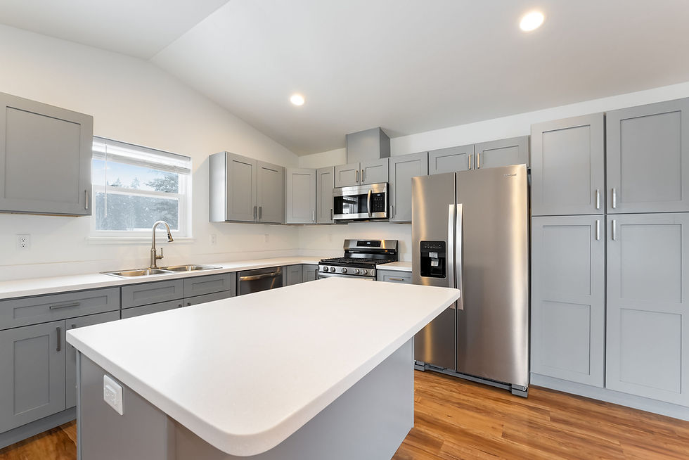 Kitchen island, stainless steel appliances, over the range microwave, gas range