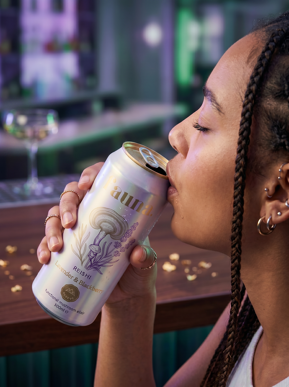 Lifestyle branding image of a customer enjoying Fauna botanical sparkling water in a modern social setting.