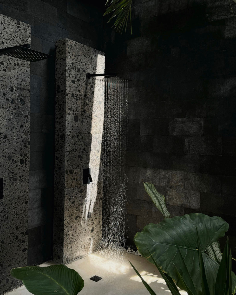 Luxury outdoor shower photography executed by Cocoia Creative Agency to highlight unique selling points and increase conversion rates for a high-end estate in Playa Hermosa.