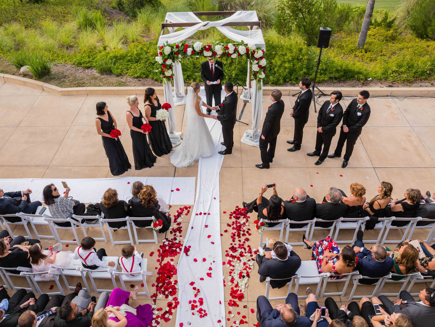 Birds eye view of wedding ceremony White wedding dress. Tuxedo Photographer Spanish Hills Country Club Camarillo GoShiggyGo Shiggy