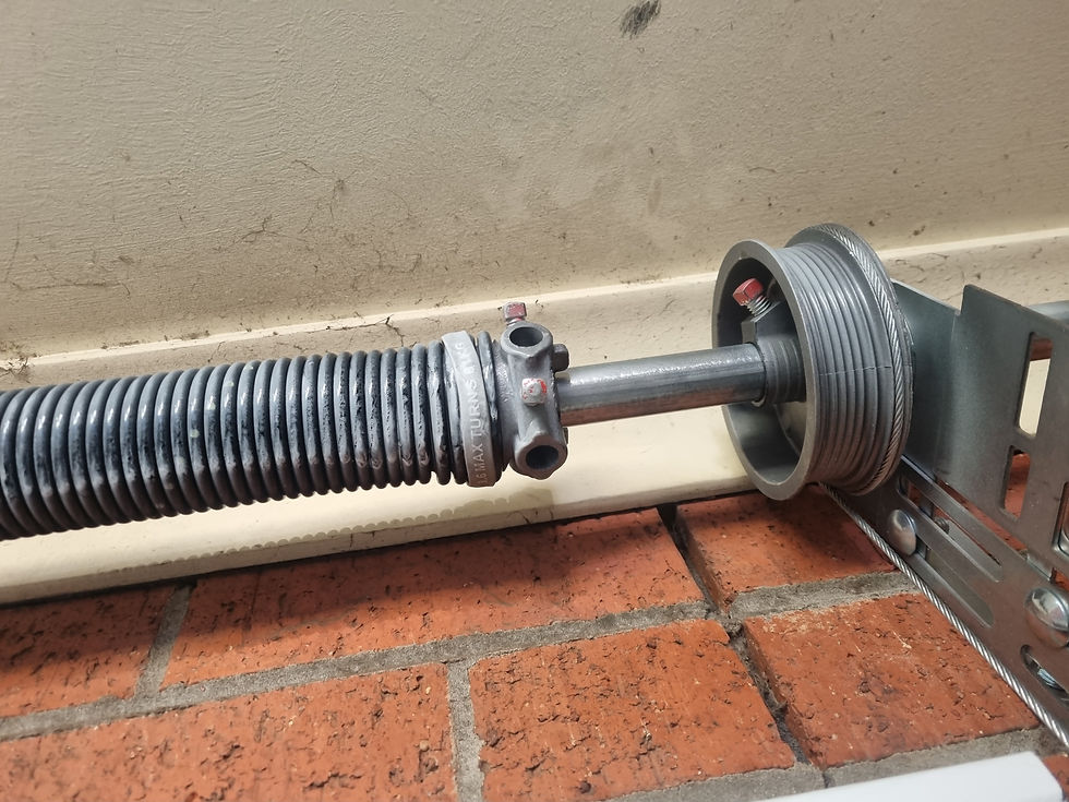 springs and cables on a sectional garage door