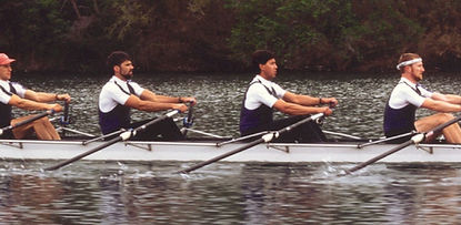 Four men rowing in quad