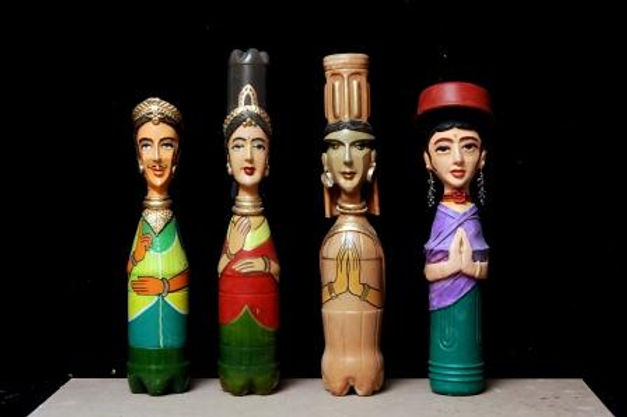 clay on used empty coke bottles.jpg